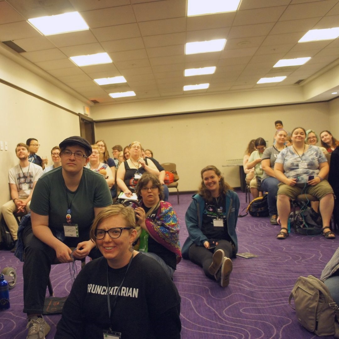 Attendees at a panel at CrossingsCon 2018