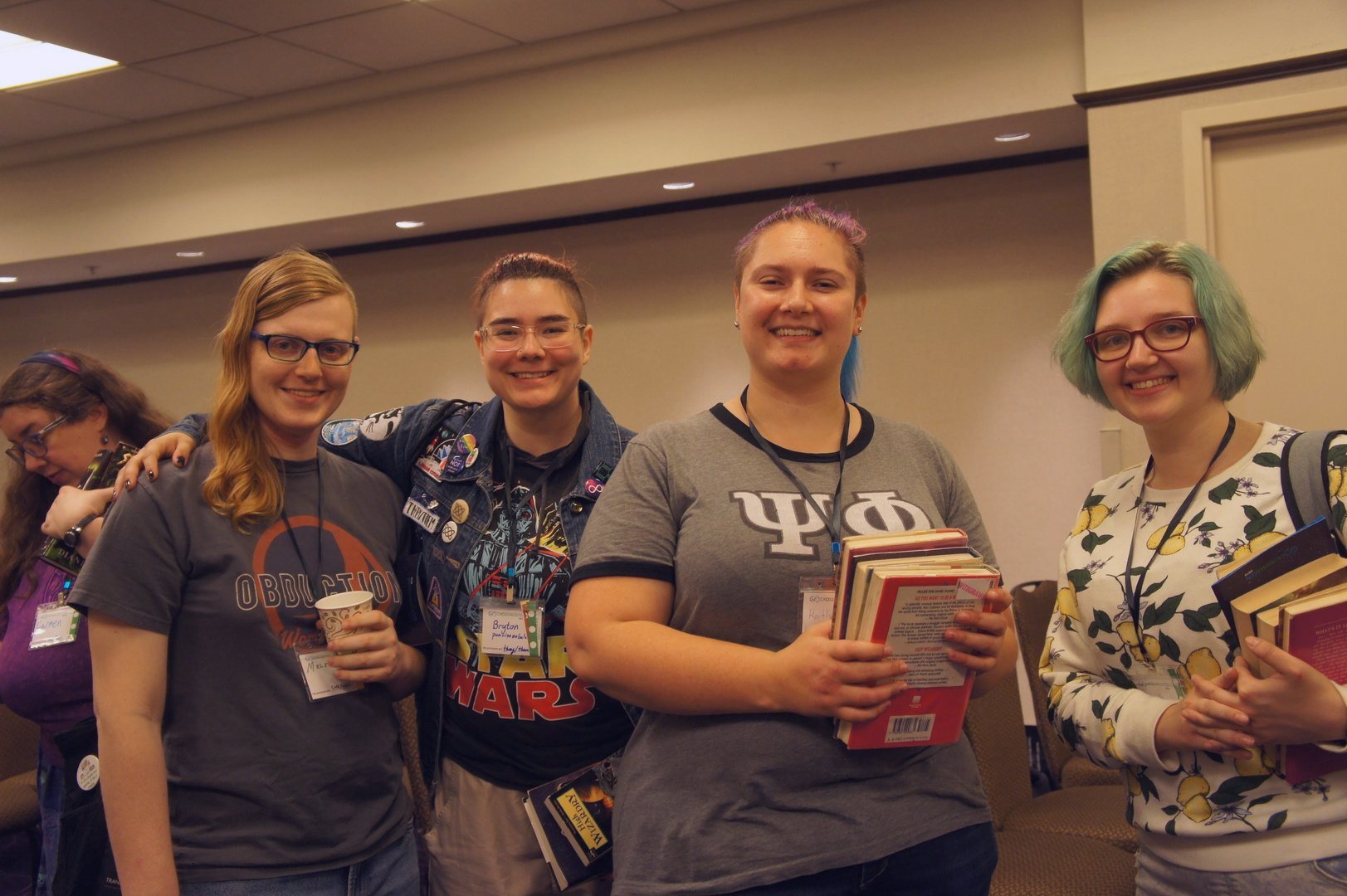 Attendees posing while waiting in the signings line